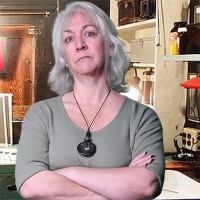 Elise Ebner Woman with shoulder-length gray hair
